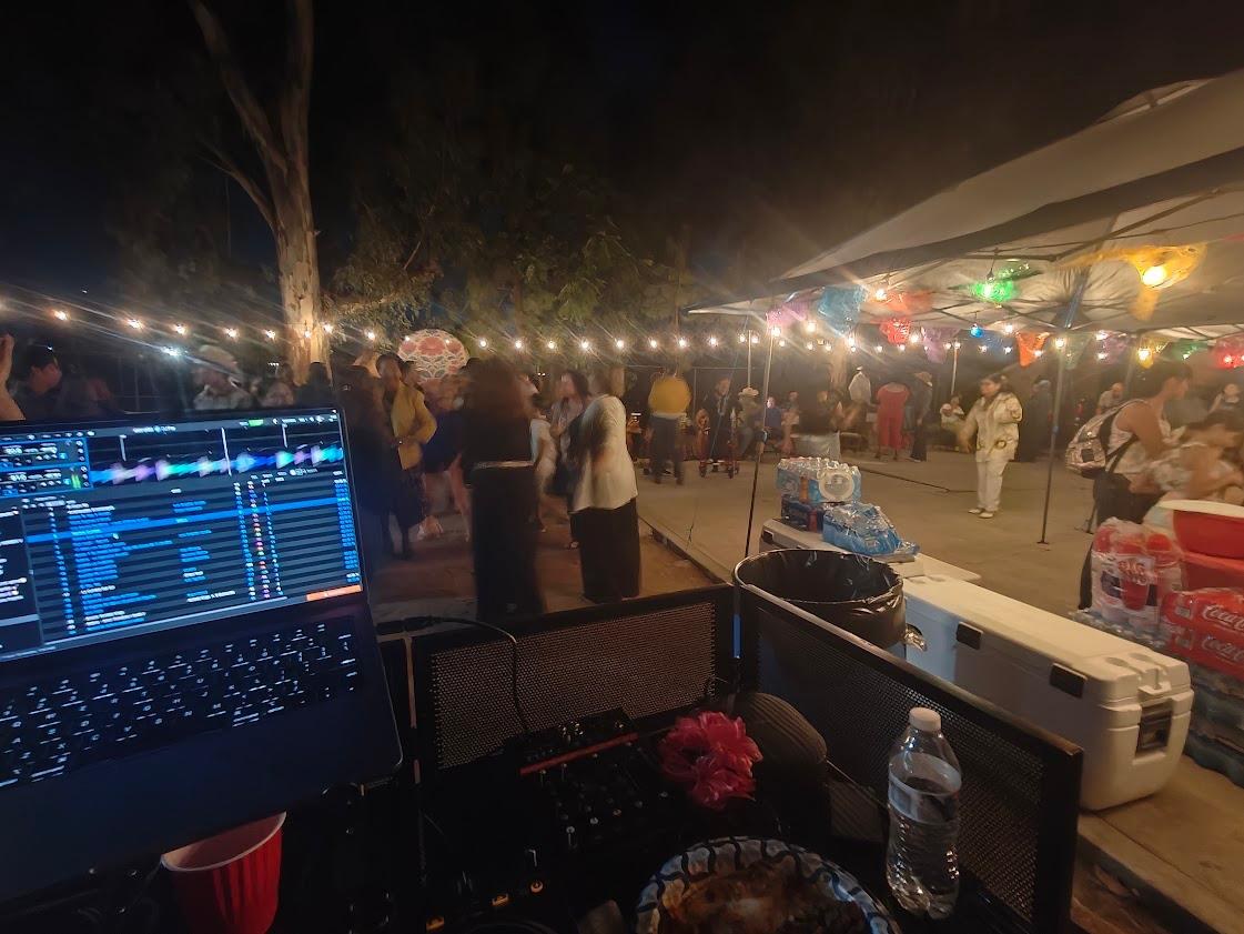 DJ booth at an outdoor evening party